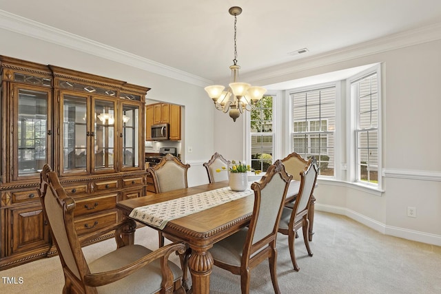 400 Indian Elm Ln, Cary, NC 27519 - dining area with a chandelier, crown molding, and light colored carpet