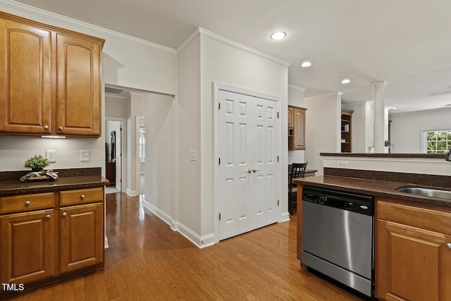 400 Indian Elm Ln, Cary, NC 27519 - kitchen featuring stainless steel dishwasher, crown molding, wood finished floors, recessed lighting, and ornate columns