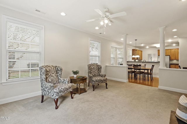 400 Indian Elm Ln, Cary, NC 27519 - sitting room with ornate columns, light colored carpet, ornamental molding, a ceiling fan, and recessed lighting