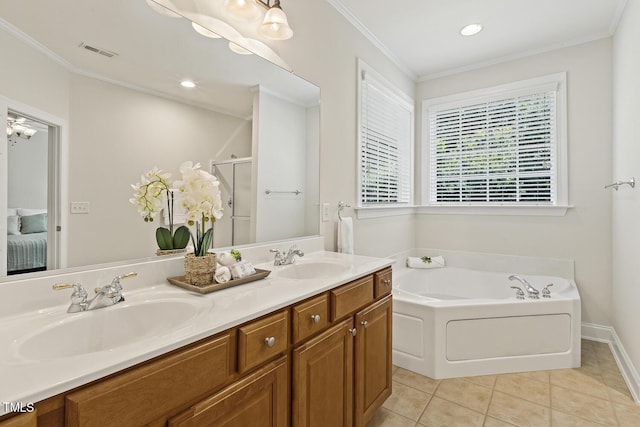 400 Indian Elm Ln, Cary, NC 27519 - ensuite bathroom featuring double vanity, a garden tub, tile patterned floors, crown molding, and a stall shower
