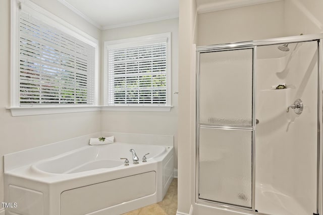 400 Indian Elm Ln, Cary, NC 27519 - bathroom featuring a stall shower, a garden tub, ornamental molding, and tile patterned flooring