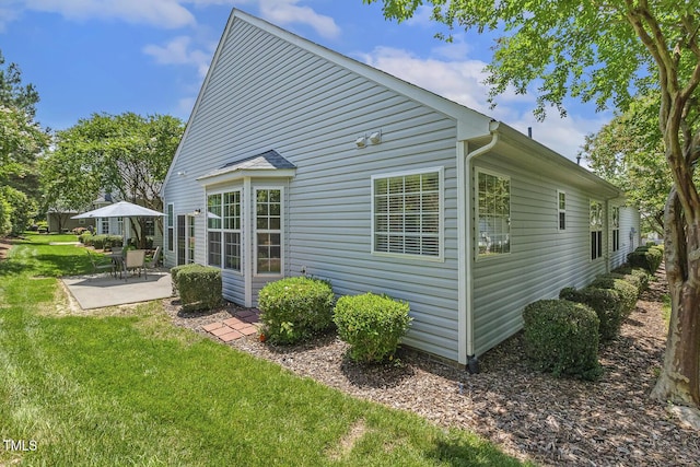 400 Indian Elm Ln, Cary, NC 27519 - rear view of property featuring a patio and a lawn