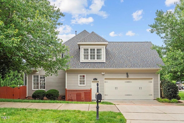 10012 San Remo Pl, Wake Forest, NC 27587 - view of front of property featuring concrete driveway, an attached garage, and a shingled roof