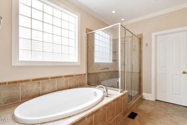 10012 San Remo Pl, Wake Forest, NC 27587 - bathroom featuring a bath, a stall shower, healthy amount of natural light, ornamental molding, and tile patterned floors