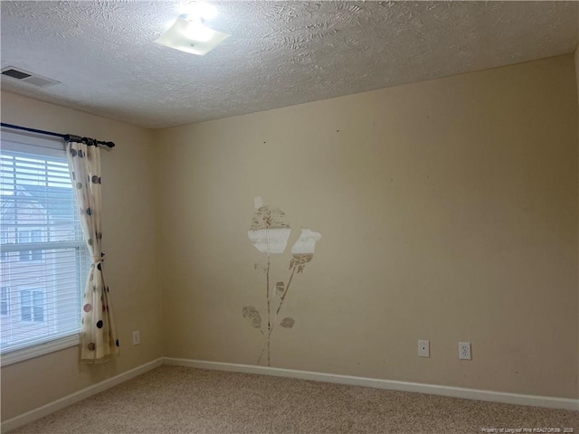 3322 Harbour Pointe Pl Unit 17, Fayetteville, NC 28314 - unfurnished room featuring light colored carpet and a textured ceiling