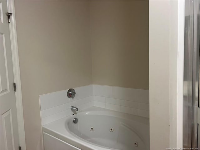 3322 Harbour Pointe Pl Unit 17, Fayetteville, NC 28314 - bathroom featuring a jetted tub