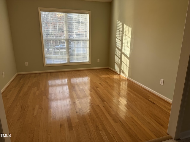 100 W Acres Cres, Cary, NC 27519 - spare room featuring light wood finished floors