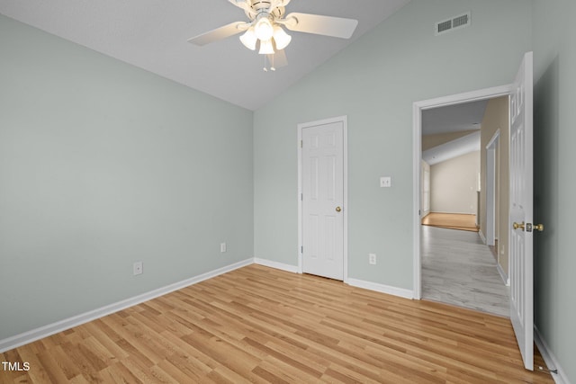 100 W Acres Cres, Cary, NC 27519 - unfurnished bedroom featuring light wood-style flooring, high vaulted ceiling, and ceiling fan