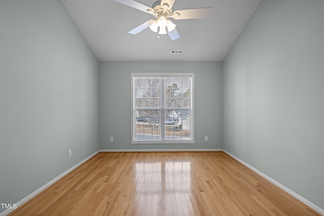 100 W Acres Cres, Cary, NC 27519 - empty room featuring light wood finished floors and ceiling fan