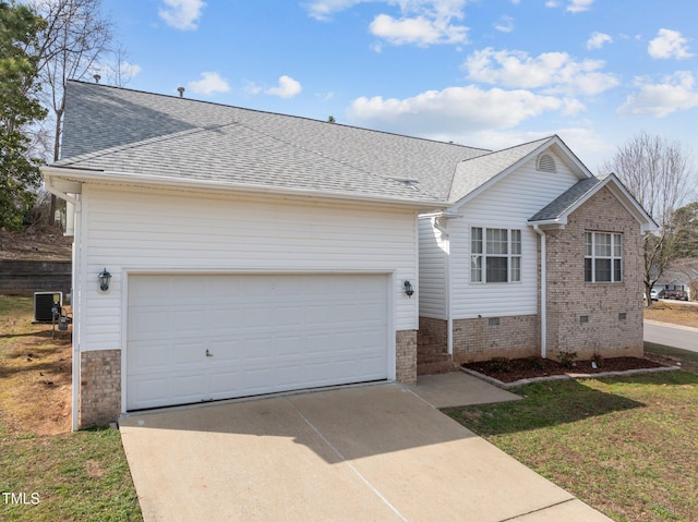 100 W Acres Cres, Cary, NC 27519 - view of front of house with roof with shingles, driveway, crawl space, and an attached garage