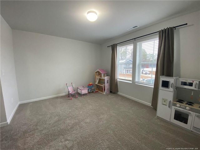 4671 Revelstroke Rd, Hope Mills, NC 28348 - game room featuring baseboards and carpet flooring