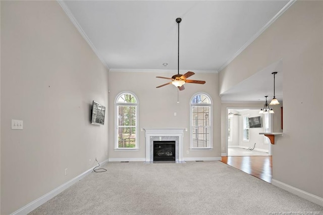 259 Rolling Pines Dr, Spring Lake, NC 28390 - unfurnished living room with carpet floors, ornamental molding, a premium fireplace, and ceiling fan