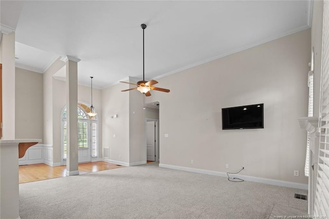 259 Rolling Pines Dr, Spring Lake, NC 28390 - unfurnished living room with light carpet, crown molding, and a ceiling fan