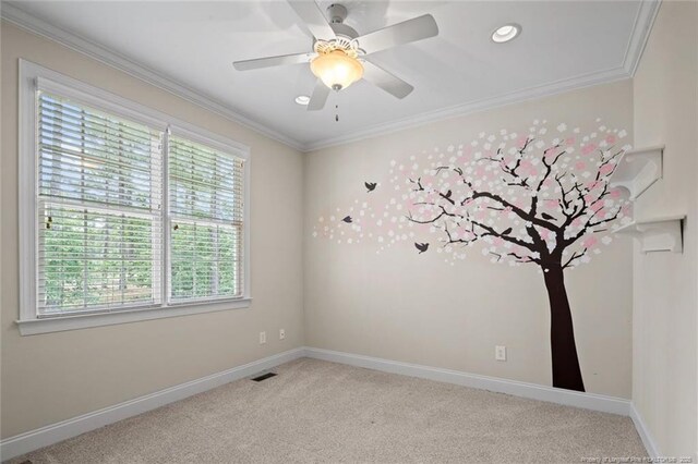 259 Rolling Pines Dr, Spring Lake, NC 28390 - empty room featuring healthy amount of natural light, crown molding, light colored carpet, recessed lighting, and ceiling fan