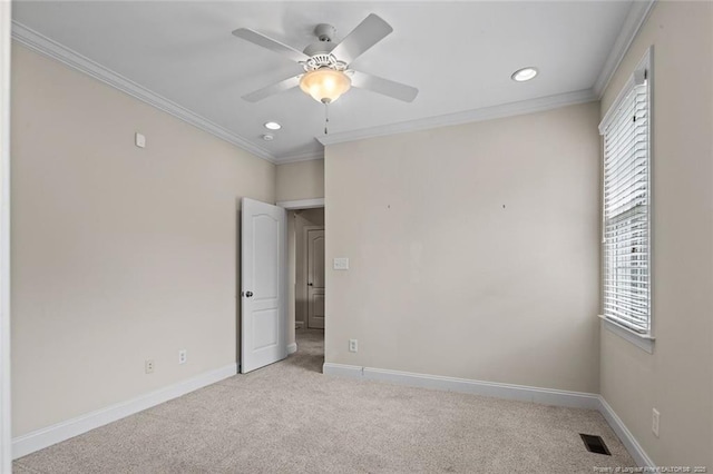 259 Rolling Pines Dr, Spring Lake, NC 28390 - empty room with plenty of natural light, light colored carpet, recessed lighting, a ceiling fan, and ornamental molding