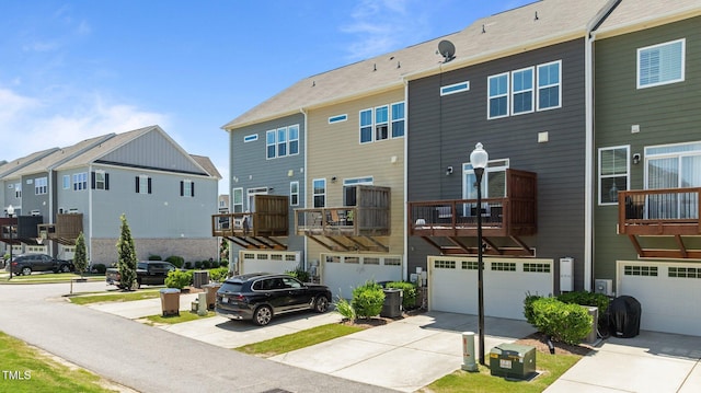 417 Austin View Blvd, Wake Forest, NC 27587 - back of property with a garage, driveway, and a residential view