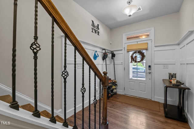 417 Austin View Blvd, Wake Forest, NC 27587 - foyer entrance with stairs, wood finished floors, and a decorative wall