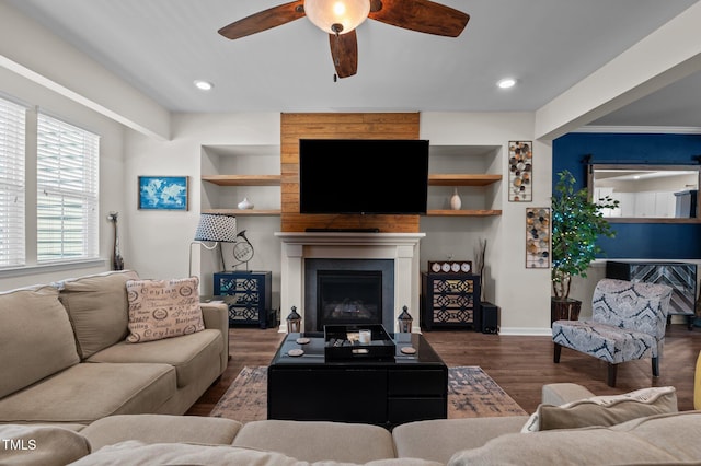 417 Austin View Blvd, Wake Forest, NC 27587 - living area featuring ceiling fan, wood finished floors, built in features, a large fireplace, and recessed lighting