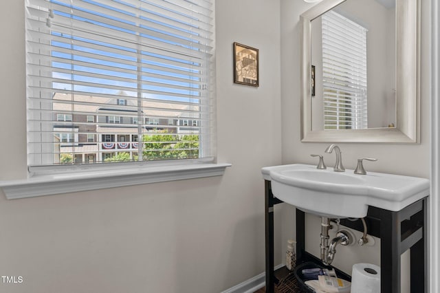 417 Austin View Blvd, Wake Forest, NC 27587 - bathroom with a sink and baseboards