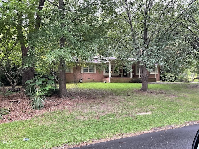 455 N Wiillow, Angier, NC 27501 - view of front of house featuring crawl space and a front yard