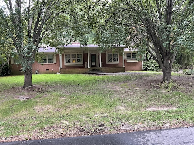 455 N Wiillow, Angier, NC 27501 - ranch-style home featuring crawl space, covered porch, a front yard, and brick siding