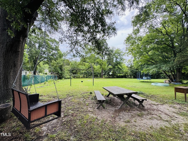 275 Gholson Ave, Henderson, NC 27536 - view of yard featuring a trampoline