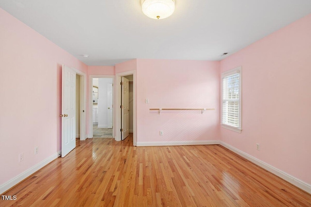 1120 Colonial Club Rd, Wake Forest, NC 27587 - spare room with light wood-style flooring and baseboards