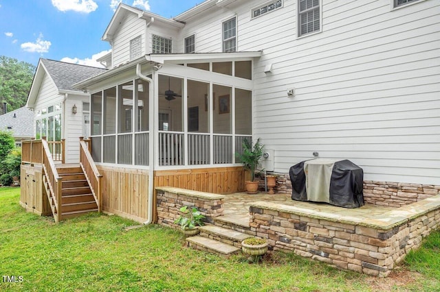 1120 Colonial Club Rd, Wake Forest, NC 27587 - back of property with a sunroom, stairway, and a yard
