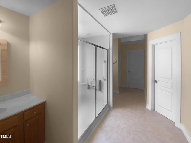 495 Ruth Cir, Fuquay Varina, NC 27526 - bathroom featuring a shower stall, vanity, and tile patterned flooring