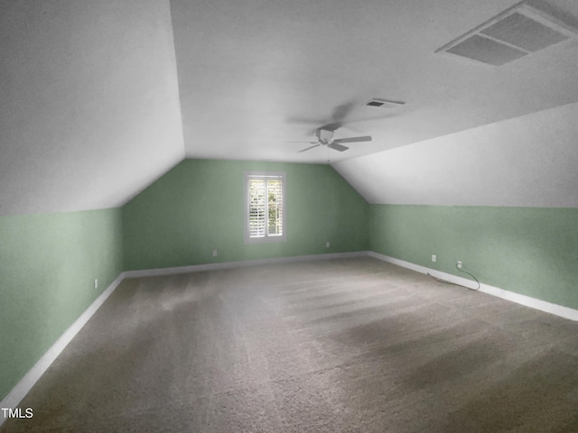 495 Ruth Cir, Fuquay Varina, NC 27526 - additional living space with vaulted ceiling, ceiling fan, and carpet flooring