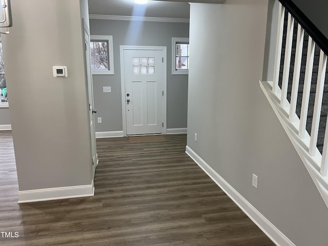 3204 Overlook Ct, Burlington, NC 27215 - entrance foyer featuring crown molding, dark wood-type flooring, and stairway