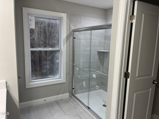 3204 Overlook Ct, Burlington, NC 27215 - full bath with a shower stall and baseboards