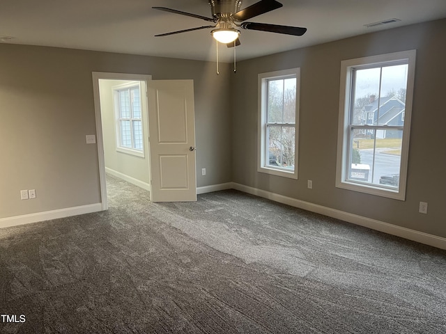 3204 Overlook Ct, Burlington, NC 27215 - empty room with carpet flooring and a ceiling fan