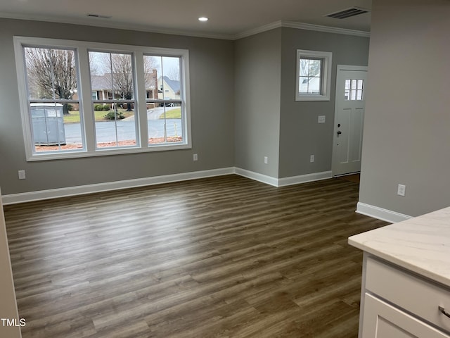 3204 Overlook Ct, Burlington, NC 27215 - unfurnished living room featuring ornamental molding, dark wood-style flooring, and recessed lighting