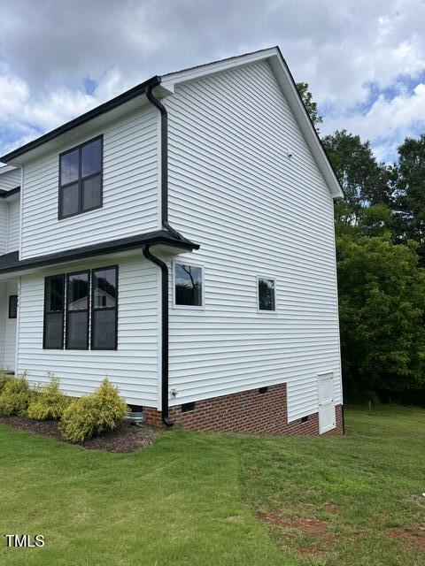 3204 Overlook Ct, Burlington, NC 27215 - view of side of property featuring crawl space and a yard