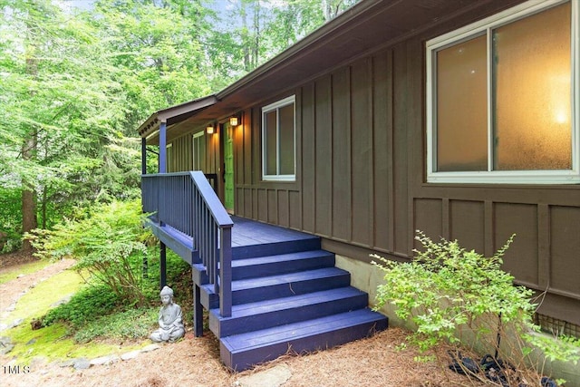 1403 Meadow Ln, Chapel Hill, NC 27516 - doorway to property with board and batten siding