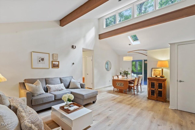 1403 Meadow Ln, Chapel Hill, NC 27516 - living room featuring healthy amount of natural light, beam ceiling, light wood finished floors, and high vaulted ceiling
