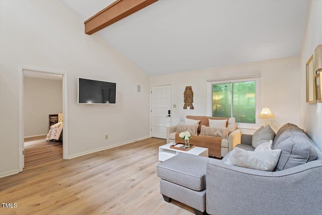 1403 Meadow Ln, Chapel Hill, NC 27516 - living room with high vaulted ceiling, light wood finished floors, and beamed ceiling