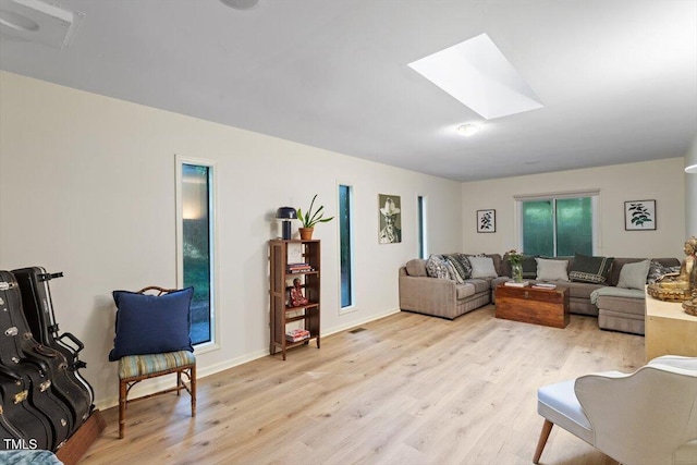 1403 Meadow Ln, Chapel Hill, NC 27516 - living area featuring light wood finished floors and a skylight