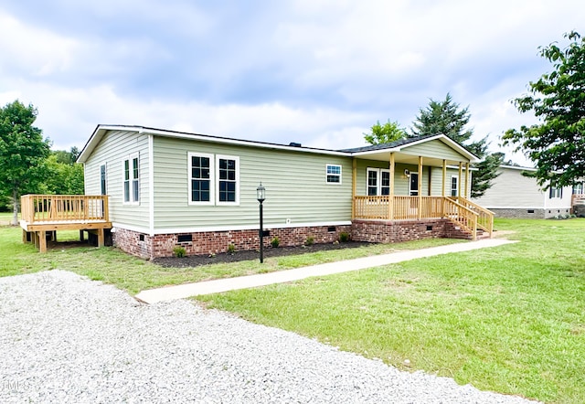 6283 US-258, Tarboro, NC 27886 - view of front of house with crawl space, a porch, and a front yard