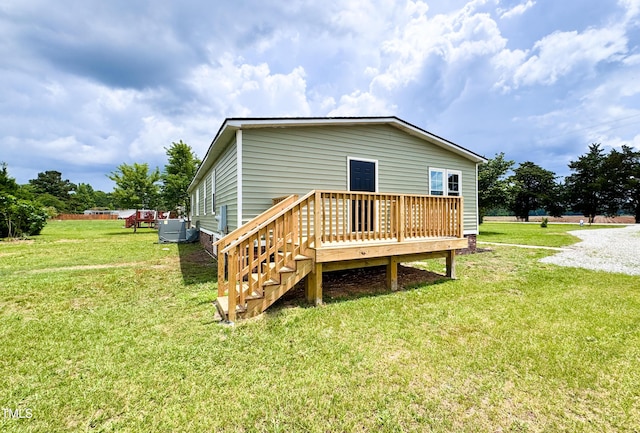 6283 US-258, Tarboro, NC 27886 - back of house featuring a wooden deck and a lawn