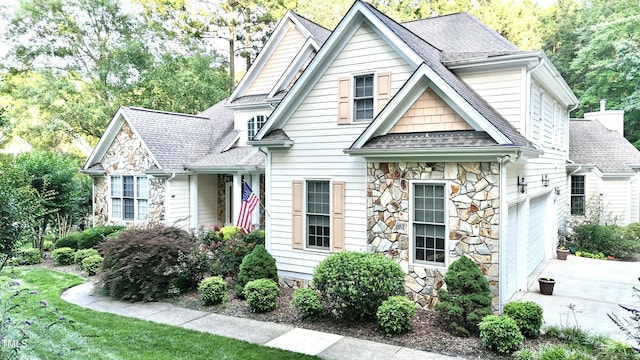 5920 Two Pines Trl, Wake Forest, NC 27587 - view of front of house featuring stone siding and roof with shingles