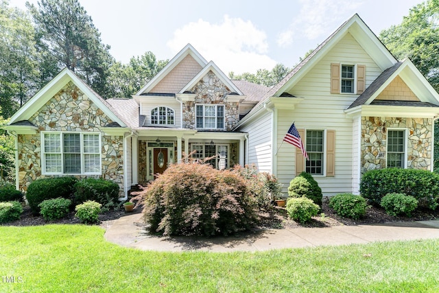 5920 Two Pines Trl, Wake Forest, NC 27587 - craftsman inspired home with stone siding and a front lawn