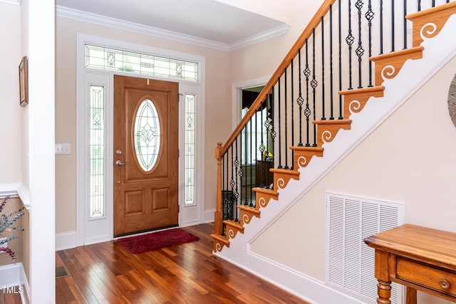 5920 Two Pines Trl, Wake Forest, NC 27587 - entrance foyer with wood finished floors, ornamental molding, and stairs