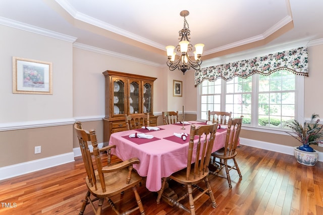 5920 Two Pines Trl, Wake Forest, NC 27587 - dining room with a chandelier, hardwood / wood-style floors, and ornamental molding