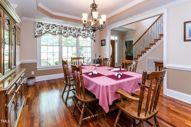 5920 Two Pines Trl, Wake Forest, NC 27587 - dining space with wood-type flooring, a chandelier, and ornamental molding