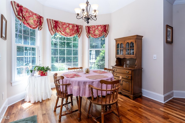 5920 Two Pines Trl, Wake Forest, NC 27587 - dining space featuring a chandelier, wood finished floors, and plenty of natural light