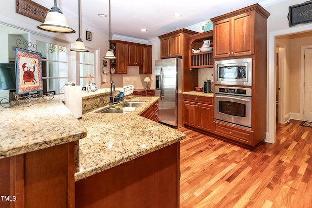 5920 Two Pines Trl, Wake Forest, NC 27587 - kitchen with appliances with stainless steel finishes, ornamental molding, open shelves, light wood-style flooring, and decorative light fixtures