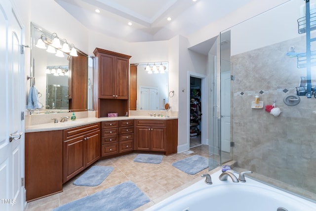 5920 Two Pines Trl, Wake Forest, NC 27587 - bathroom featuring double vanity, a shower stall, a garden tub, a spacious closet, and tile patterned flooring