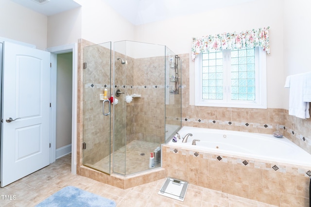 5920 Two Pines Trl, Wake Forest, NC 27587 - bathroom with a jetted tub, a shower stall, and tile patterned floors
